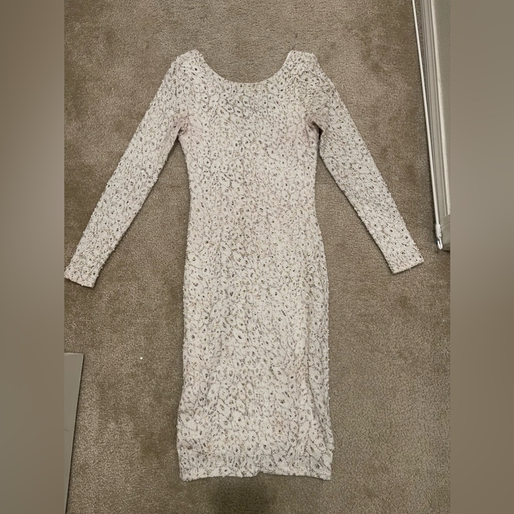 White with gold long sleeve dress. Bump friendly. Size small. Good condition